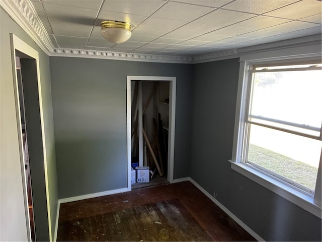 empty room with dark hardwood / wood-style flooring