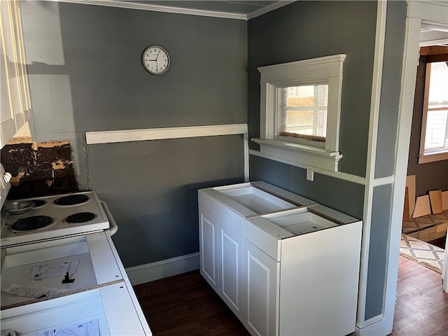 kitchen with a healthy amount of sunlight, ornamental molding, white cabinetry, and dark wood-type flooring