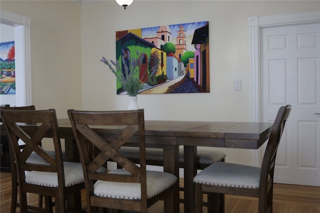 dining room featuring wood-type flooring