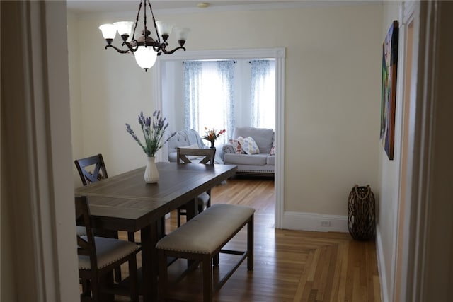 dining area with a notable chandelier