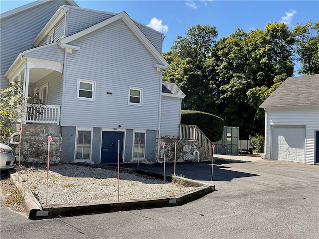 view of property exterior featuring a garage