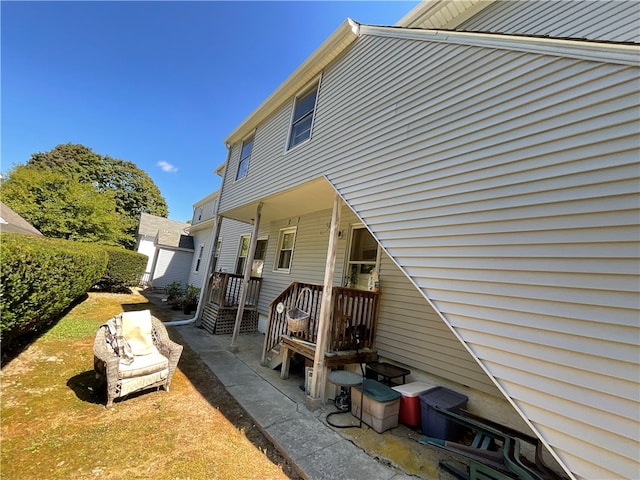 view of property exterior featuring a patio