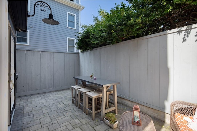 view of patio / terrace with fence