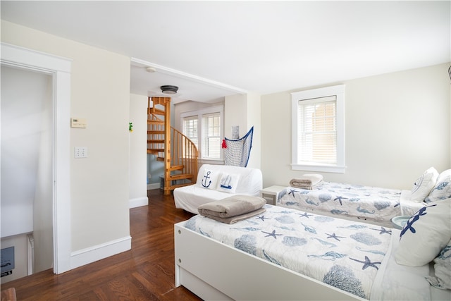 bedroom featuring dark hardwood / wood-style floors