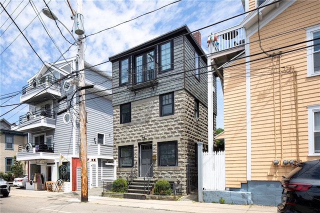 exterior space featuring a balcony