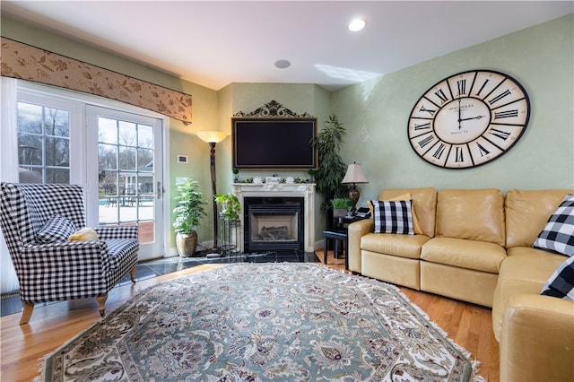 living room with light hardwood / wood-style flooring