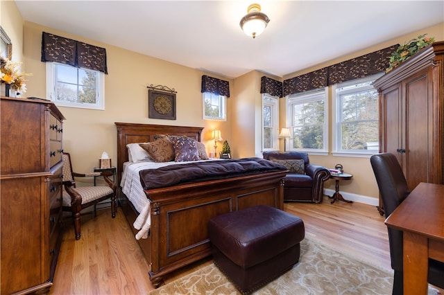 bedroom featuring light wood-type flooring