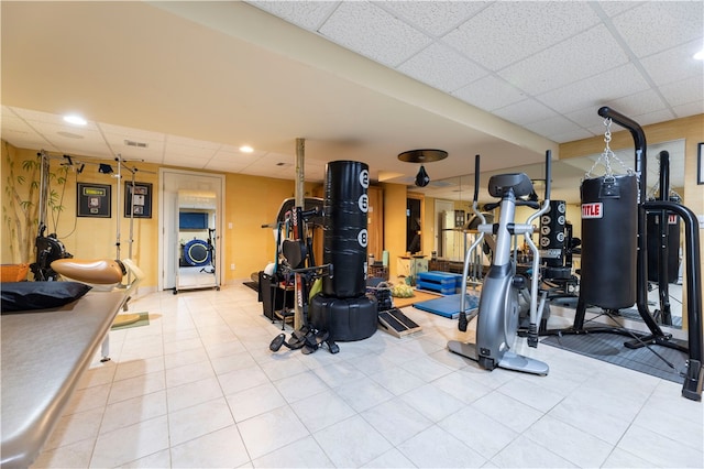 gym with a drop ceiling