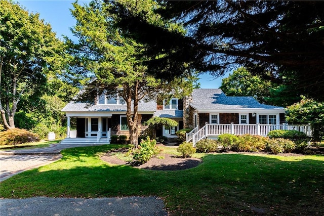 split level home with a front yard