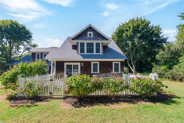 view of front of house with a front lawn