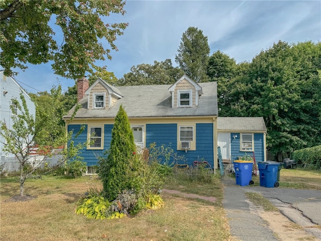 view of new england style home