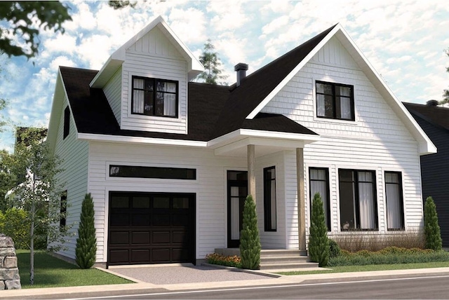 modern inspired farmhouse featuring a garage