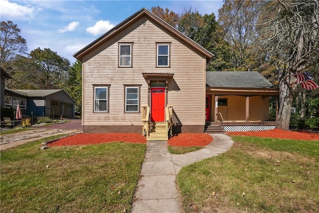 view of property featuring a front yard