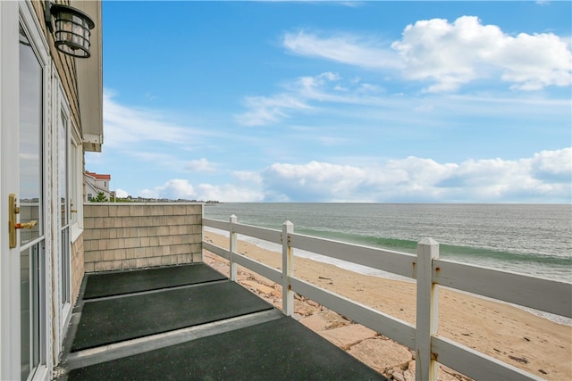 exterior space with a view of the beach and a water view