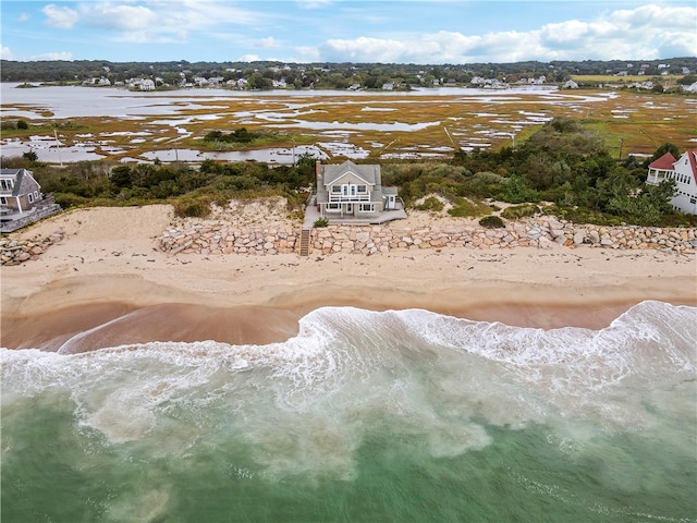 aerial view with a view of the beach and a water view