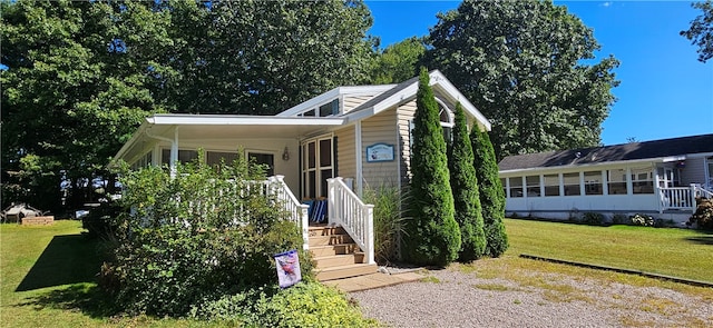 view of front of home with a front lawn