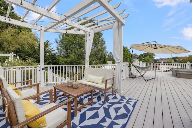 deck featuring outdoor lounge area and a pergola