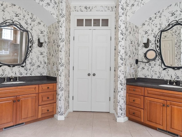 bathroom with vanity and tile patterned floors