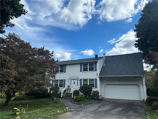 view of front of home with a garage