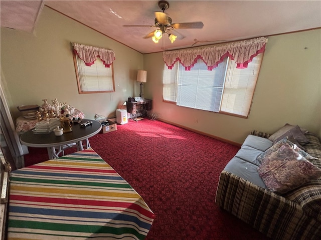 bedroom featuring ceiling fan, carpet floors, and vaulted ceiling