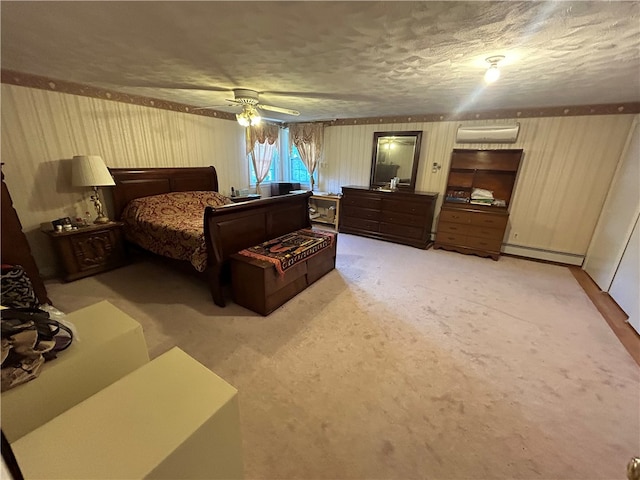 bedroom with a baseboard radiator, ceiling fan, carpet flooring, and a textured ceiling