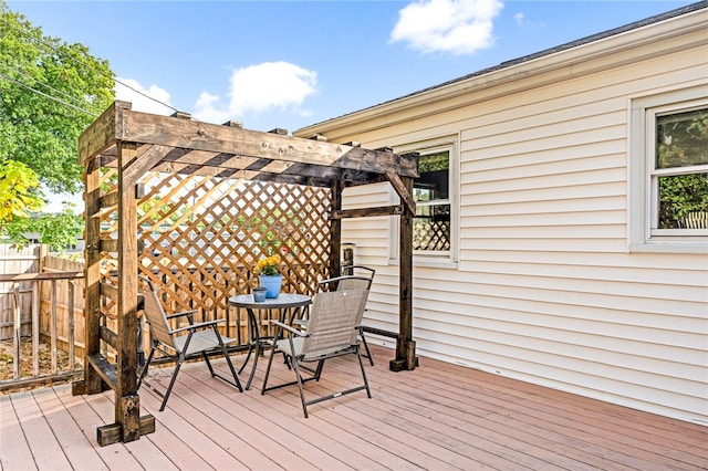 wooden deck featuring a pergola