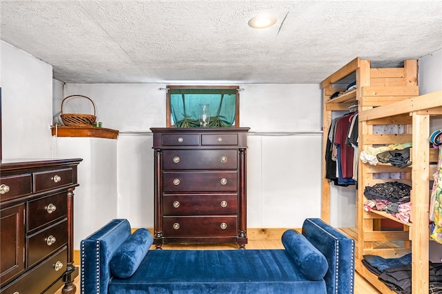 spacious closet featuring hardwood / wood-style floors