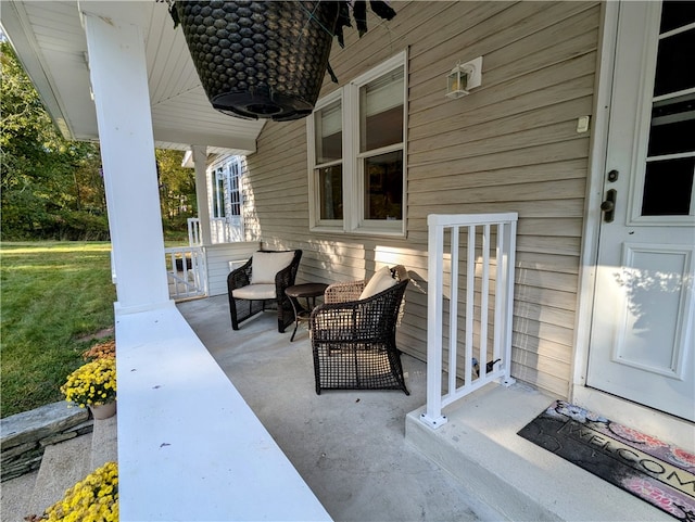 view of patio featuring a porch and ceiling fan