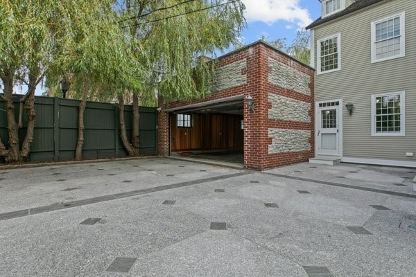 exterior space featuring a carport