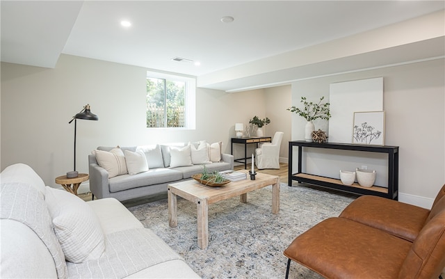 living room with light hardwood / wood-style flooring