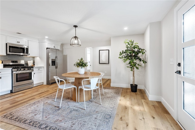 dining area featuring light hardwood / wood-style floors