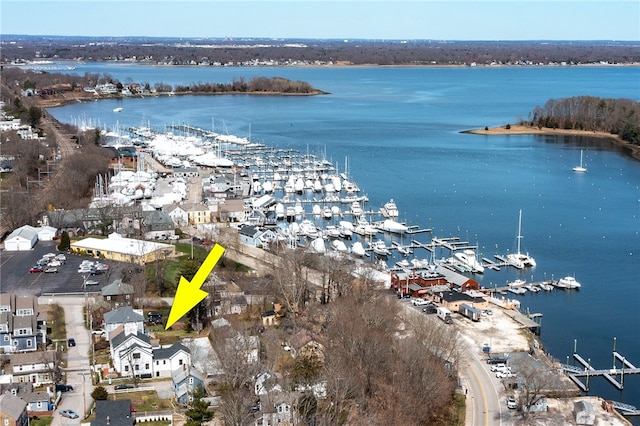 birds eye view of property featuring a water view