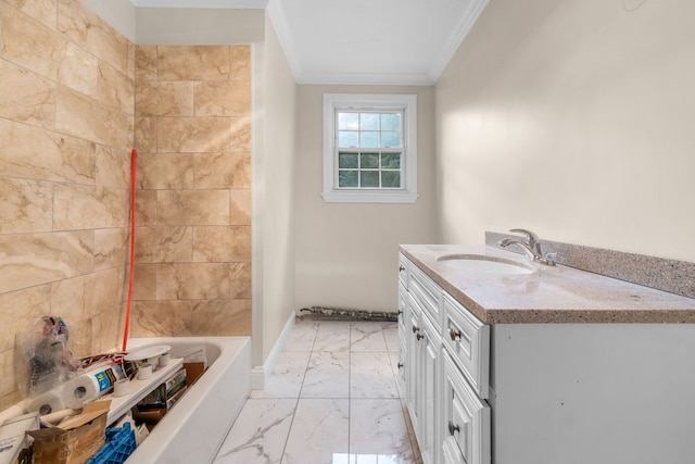 bathroom featuring vanity, crown molding, and a bath