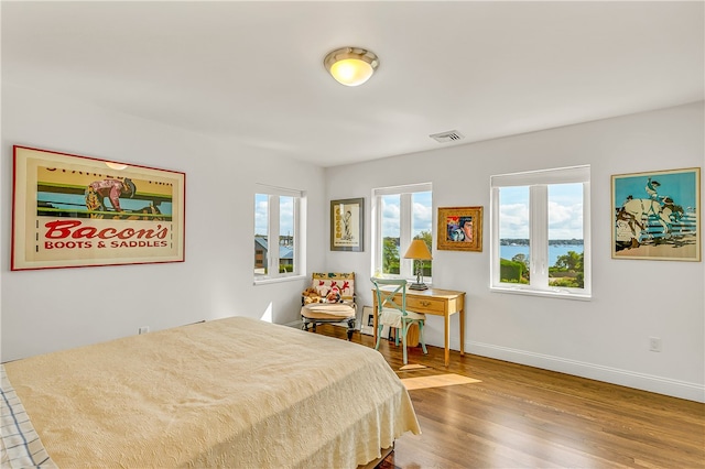 bedroom featuring hardwood / wood-style floors