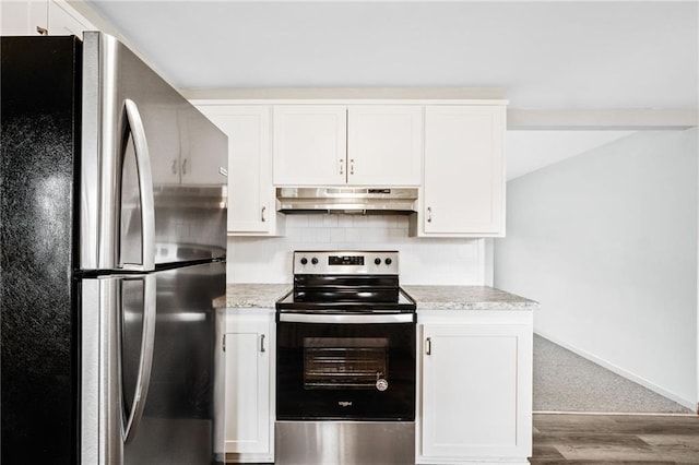 kitchen with stainless steel appliances, wood-type flooring, white cabinets, backsplash, and light stone countertops