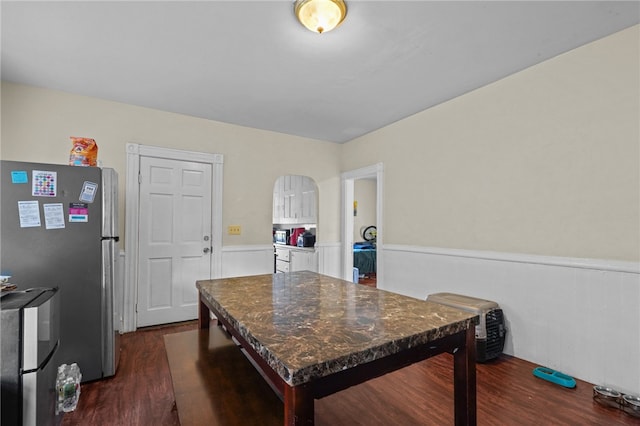 interior space with dark hardwood / wood-style flooring