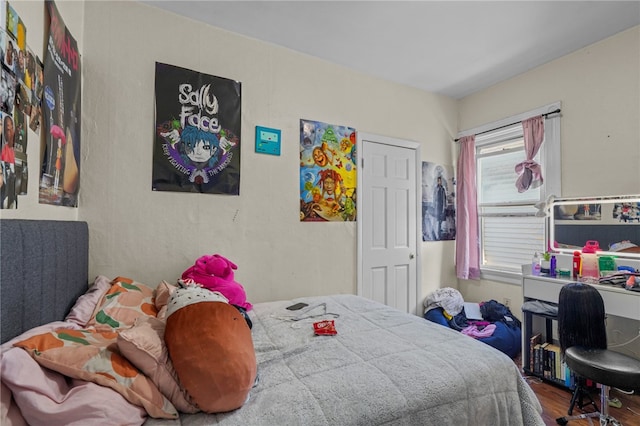 bedroom featuring hardwood / wood-style flooring