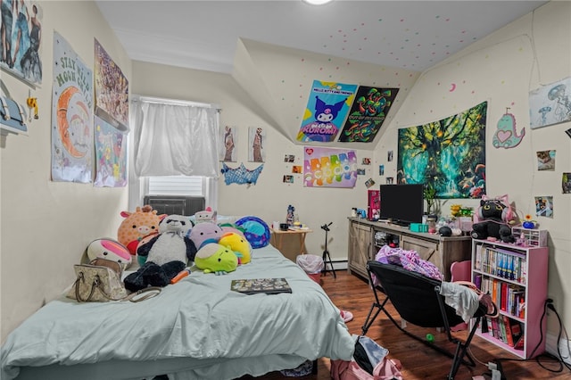 bedroom featuring cooling unit, a baseboard radiator, lofted ceiling, and hardwood / wood-style floors