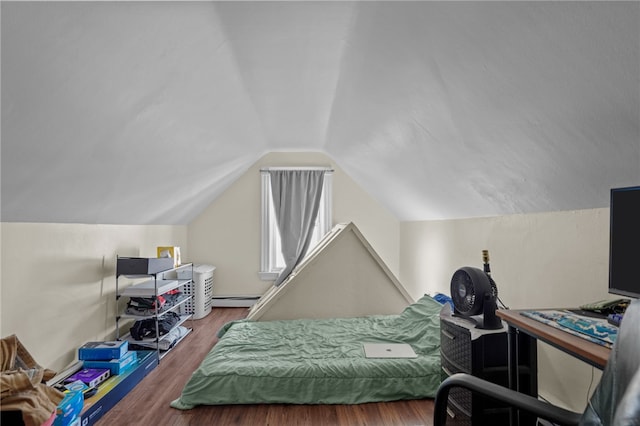 bedroom featuring hardwood / wood-style flooring, lofted ceiling, and a baseboard heating unit