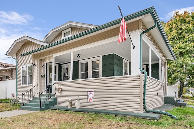 view of front of home with a front lawn