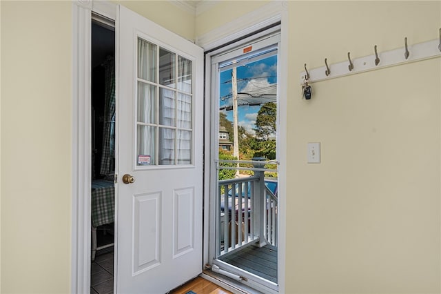 doorway with hardwood / wood-style floors