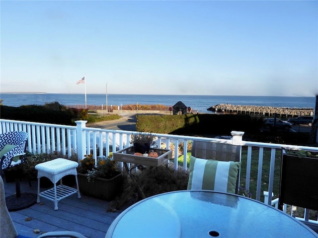 deck featuring a water view