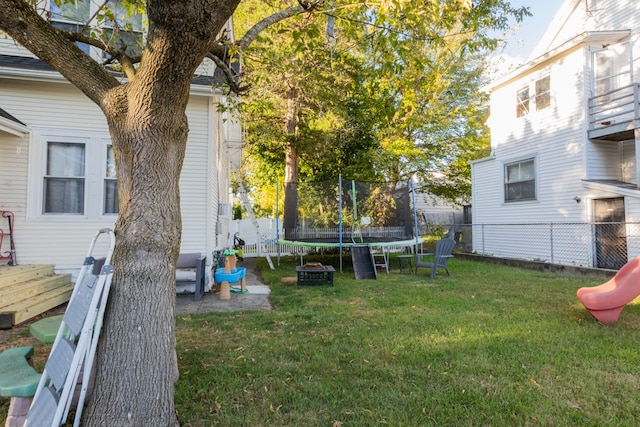 view of yard featuring a trampoline