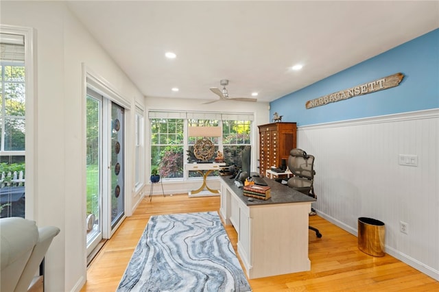 office area with light hardwood / wood-style flooring and a wealth of natural light