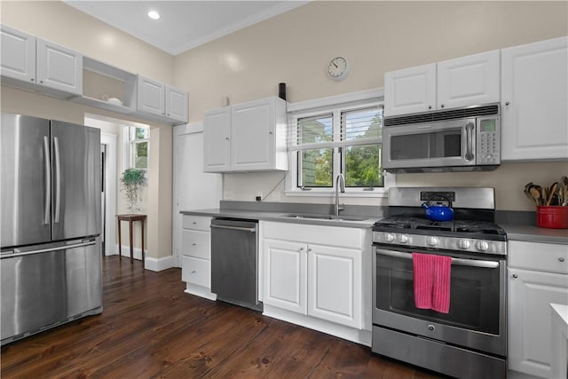 68 Kay St, Newport, RI 02840 - kitchen with white cabinets, stainless steel appliances, dark wood-style floors, and a sink
