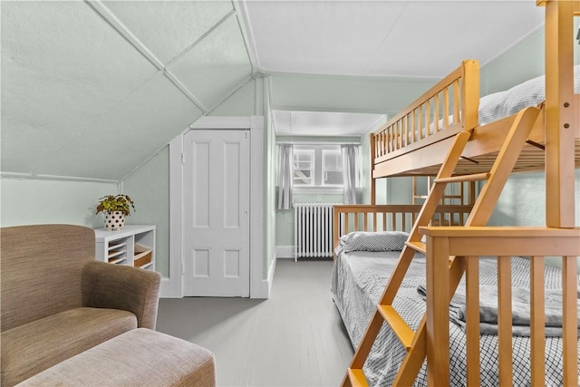 68 Kay St, Newport, RI 02840 - bedroom with lofted ceiling and radiator heating unit