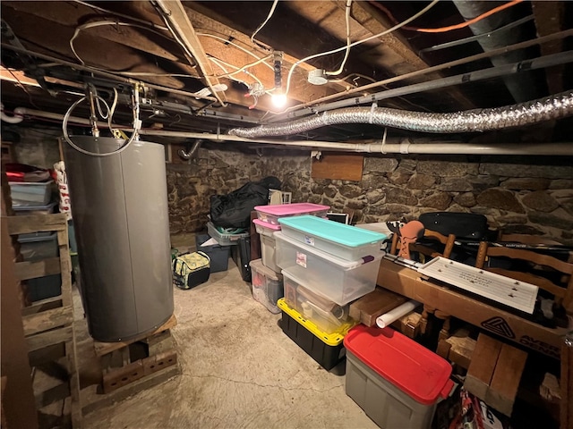 basement featuring gas water heater