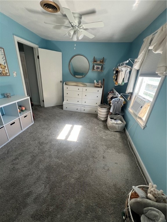 unfurnished bedroom with carpet and ceiling fan