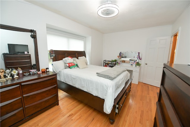 bedroom with light wood-type flooring