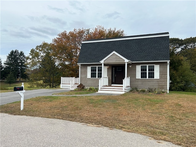 view of front of home with a front yard